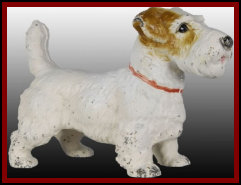 101105_phillumeny_cast_iron_doorstops_goofus_glass_austen_bond_auctions001005.jpg